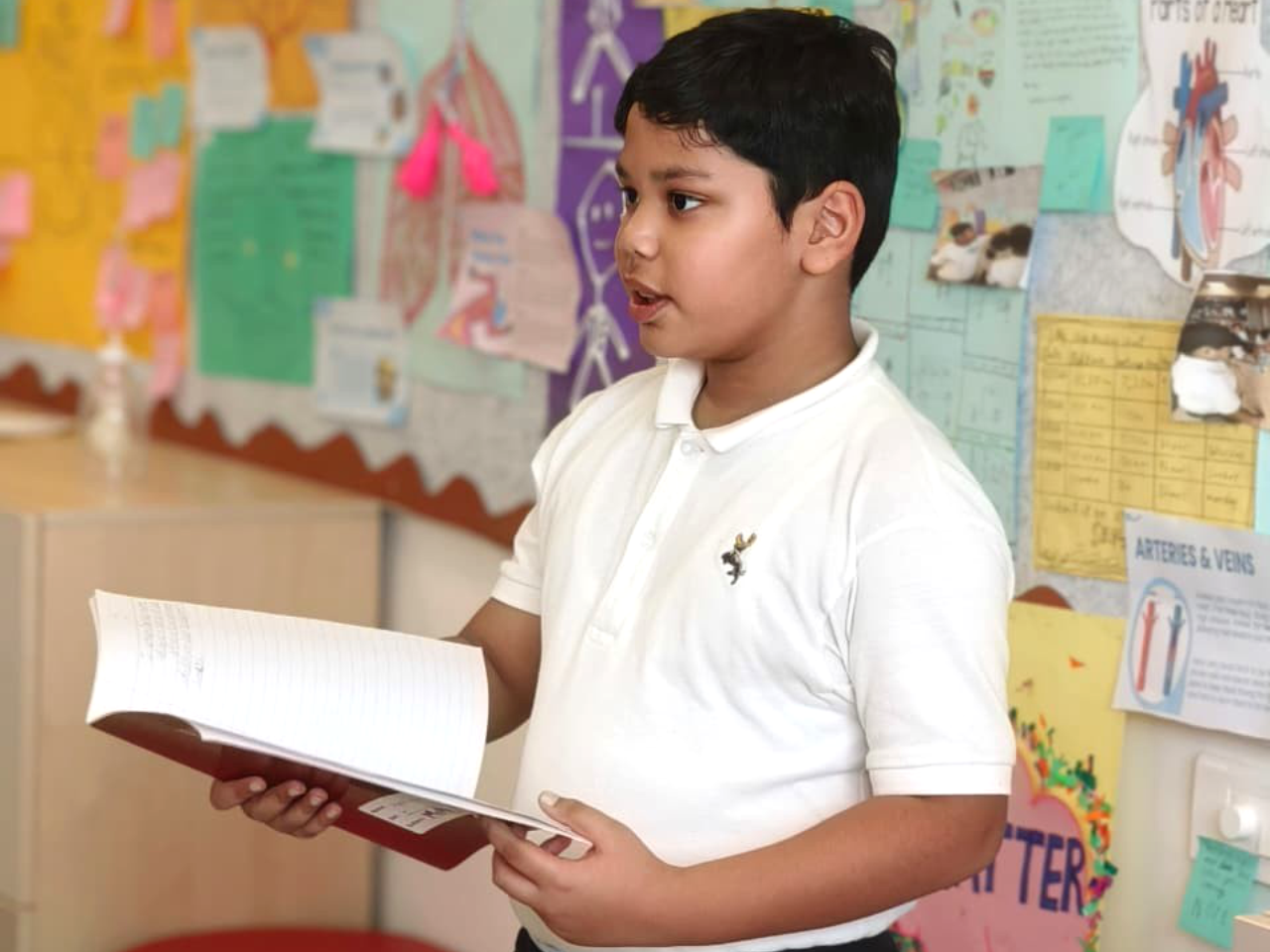 A RISE student sharing his thoughts during a classroom activity